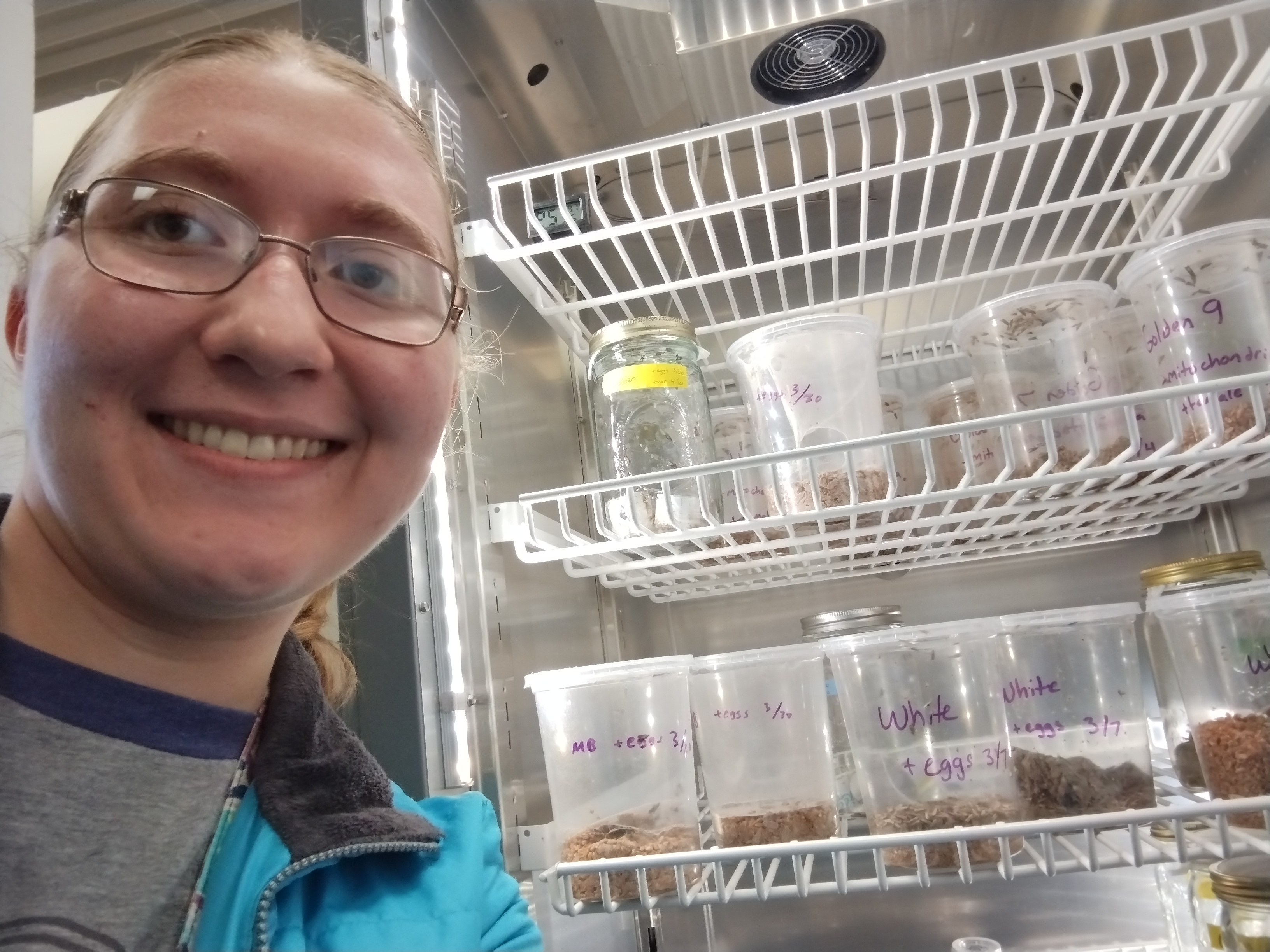 Cailin in front of her scientific samples